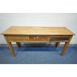 A PINE SIDE TABLE, with three drawers, on square legs, length 167cm x depth 57cm x height 82cm (