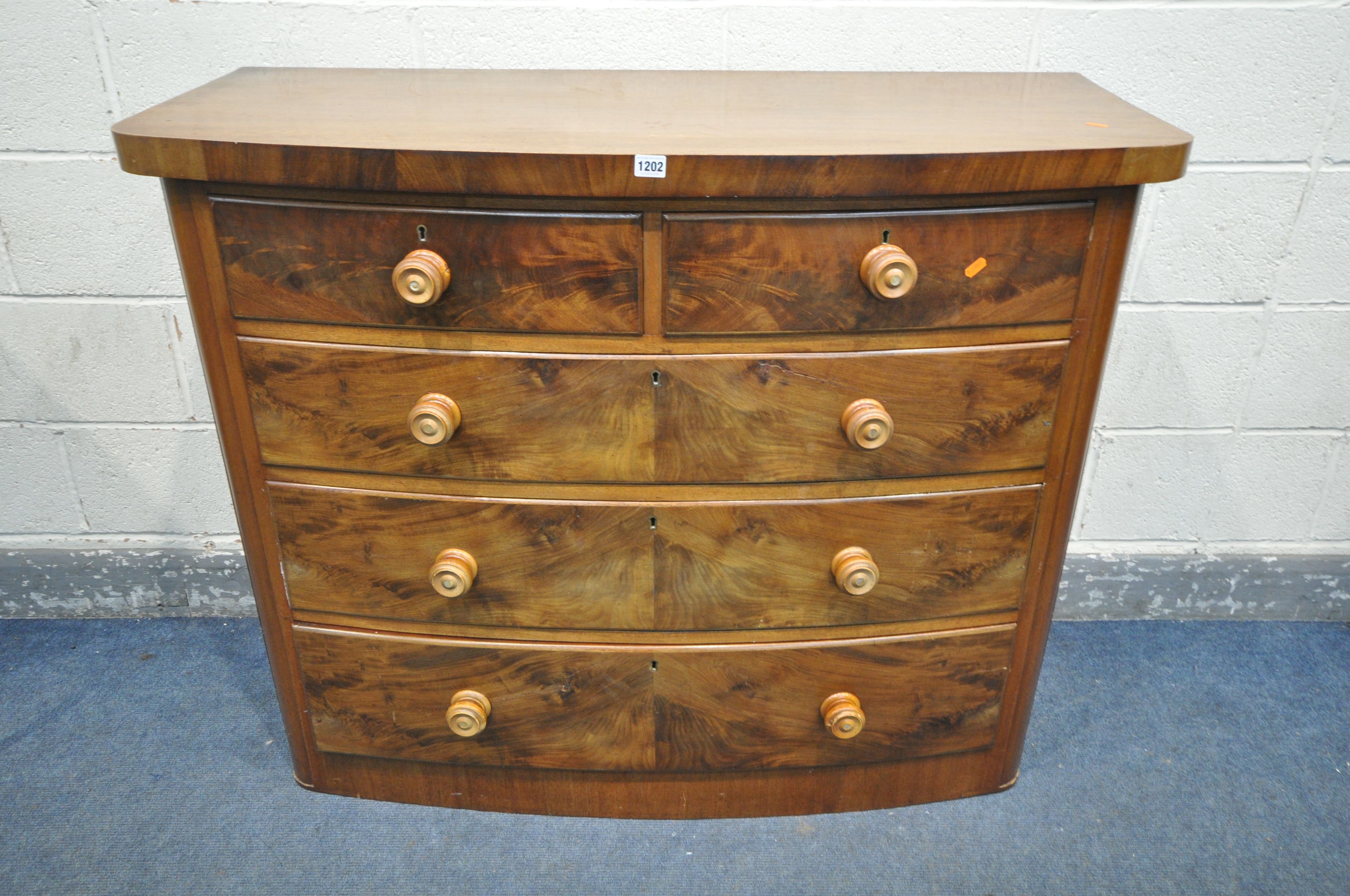 A VICTORIAN FLAME MAHOGANY BOWFRONT CHEST OF TWO SHORT OVER THREE LONG DRAWERS, width 120cm x