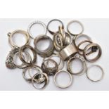 A BAG OF ASSORTED WHITE METAL RINGS, to include two yellow and white metal paste set cluster