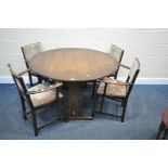 AN OAK DROP LEAF TRESTLE DINING TABLE, open diameter 122cm x closed width 61cm x height 74cm, and