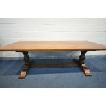A REPRODUCTION OAK 17TH CENTURY STYLE REFECTORY TABLE, on square shaped legs, united by a floor