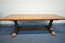 A REPRODUCTION OAK 17TH CENTURY STYLE REFECTORY TABLE, on square shaped legs, united by a floor