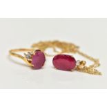 A RUBY RING AND PENDANT, the pendant set with an oval cut ruby accented with a single round