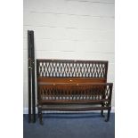 AN EARLY 20TH CENTURY HEAL AND SON OF LONDON 5FT BEDSTEAD, with a lattice design, with irons,