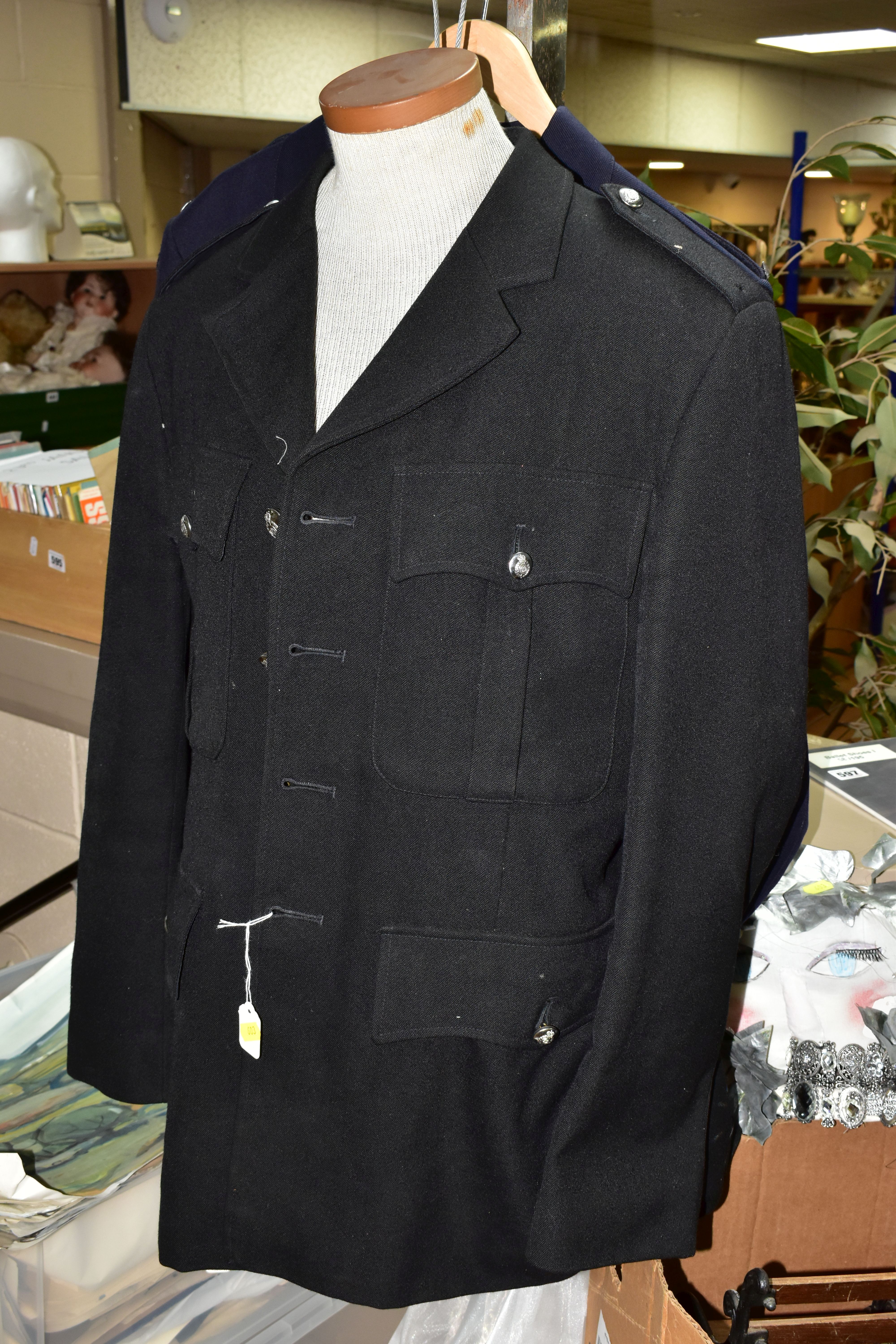 TWO BOXES, A SUITCASE AND LOOSE CLOTHING, ACCESSORIES AND DVDS, to include a black uniform jacket