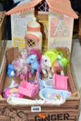 AN UNBOXED MY LITTLE PONY BABY HOUSE, with a quantity of figures and accessories, some fading and