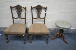 A VICTORIAN WALNUT SWIVEL TOP PIANO STOOL, and a pair of Edwardian nursing chairs (3)