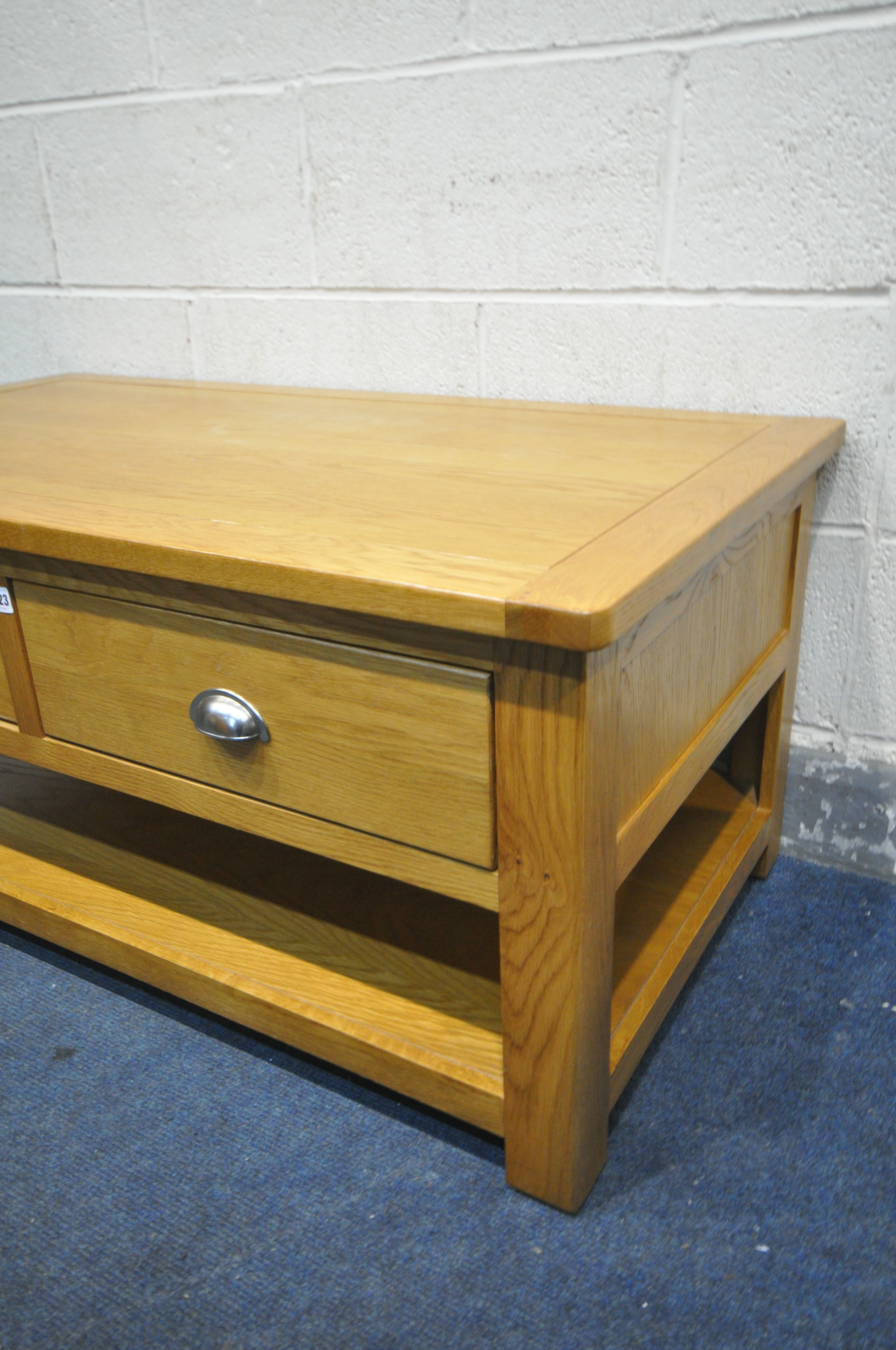 AN OAK COFFEE TABLE, with two drawers, and undershelf, length 110cm x depth 60cm x height 50cm ( - Image 2 of 3