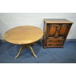 A REPRODUCTION CIRCULAR OAK PEDESTAL DINING TABLE, diameter 106cm x height 76cm, and reproduction