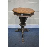 A LATE VICTORIAN WALNUT AND MARQUETRY INLAID TRUMPET SEWING TABLE, the hexagonal lid enclosing a
