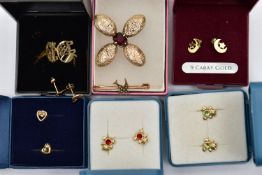 A SELECTION OF YELLOW METAL EARRINGS AND TWO BROOCHES, to include a pair of openwork yellow metal