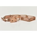 A ROSE METAL GATE BRACELET, a three bar gate bracelet, fitted with a swivel lobster clasp fitted