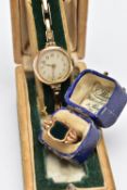 AN EARLY 20TH CENTURY SIGNET RING AND A WRISTWATCH, a yellow gold signet ring inlay set with a
