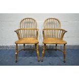A PAIR OF REPRODUCTION ELM AND ASH WINDSOR AMRCHAIRS, with dish shaped seats (condition:-surface