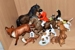 A COLLECTION OF BESWICK AND ROYAL DOULTON FOX HUNTING HOUNDS AND FIGURES, comprising a Royal Doulton