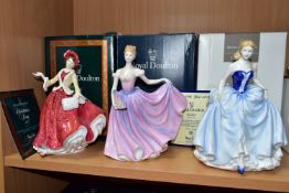 THREE BOXED ROYAL DOULTON FIGURINES, comprising Christmas Day 1999 HN4214, with certificate (very