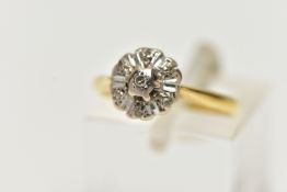 A DIAMOND CLUSTER RING, set with a principal single cut diamond, within an old cut diamond surround,