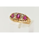 AN EARLY 20TH CENTURY 18CT GOLD RUBY AND DIAMOND RING, three oval cut rubies set with four rose