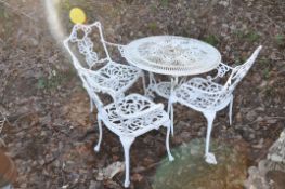 A PAINTED ALUMINIUM GARDEN TABLE 79cm in diameter and three chairs (4)