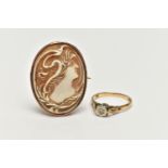 A 9CT GOLD RING AND SHELL CAMEO, a single cut diamond, set within a white metal illusion setting,