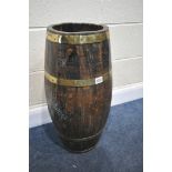 AN ANTIQUE OAK AND BRASS BANDED BARREL, approximate diameter 32cm, height 66cm (condition -