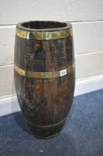AN ANTIQUE OAK AND BRASS BANDED BARREL, approximate diameter 32cm, height 66cm (condition -