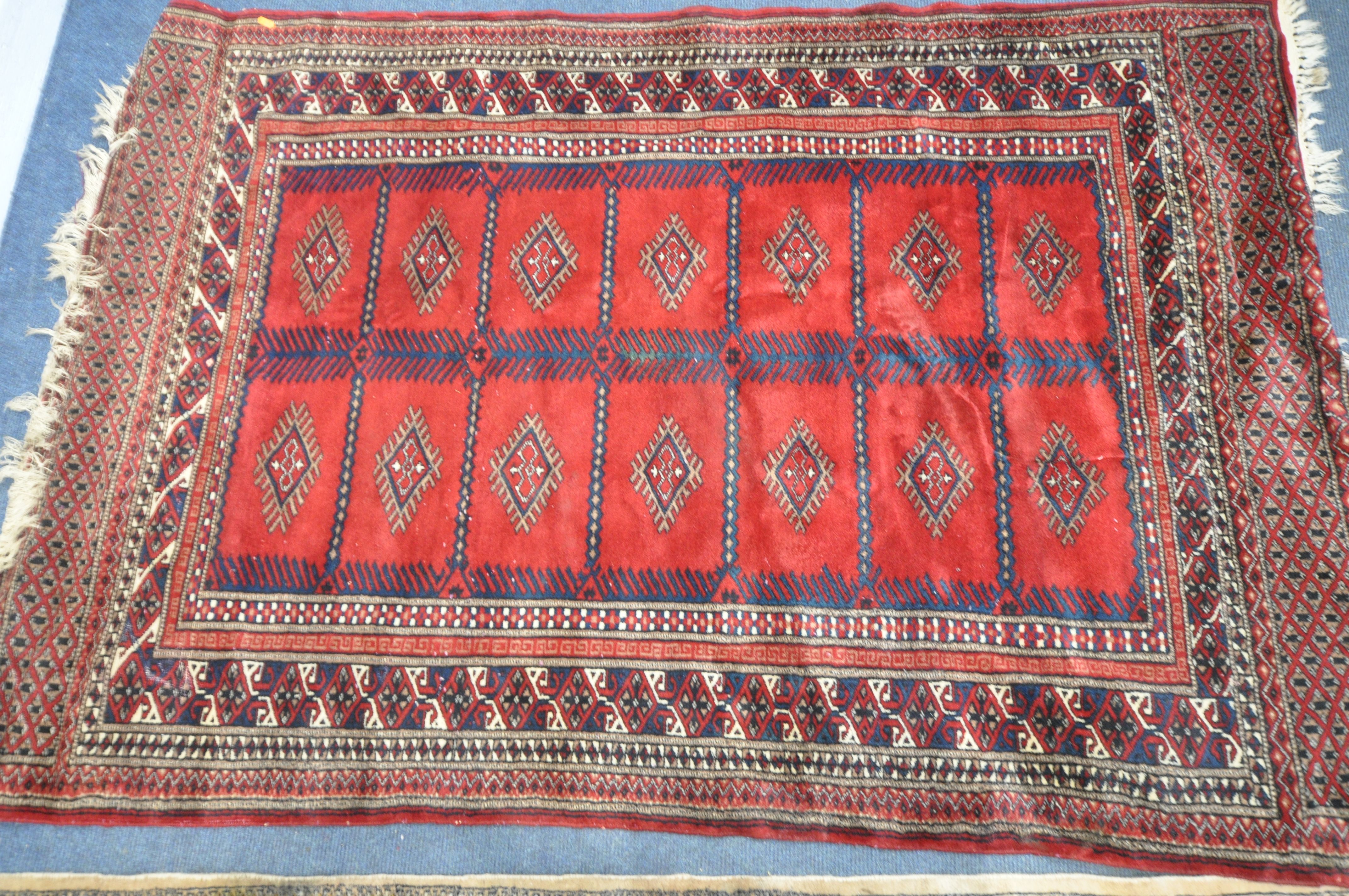 TWO 20TH CENTURY WOOLLEN RUGS one with red field 186cm x 124cm and the other russet coloured, - Image 2 of 6