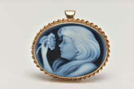 A 9CT GOLD CAMEO BROOCH, blue agate laser carved to depict a girl with a flower, set in a yellow