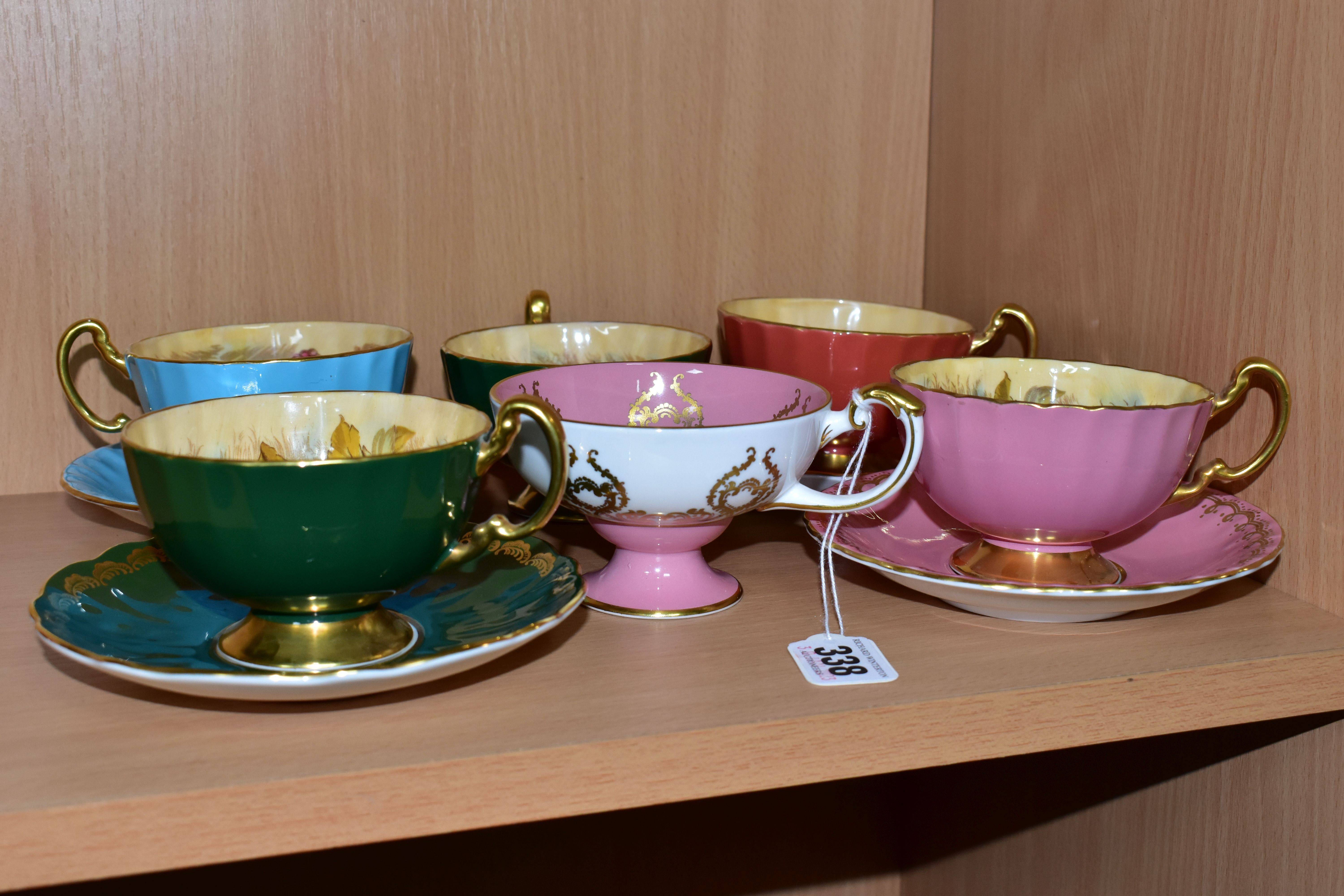 A SET OF FOUR AYNSLEY ORCHARD GOLD CABINET TEA CUPS AND SAUCERS, all cups are signed by D.Jones, - Image 3 of 4