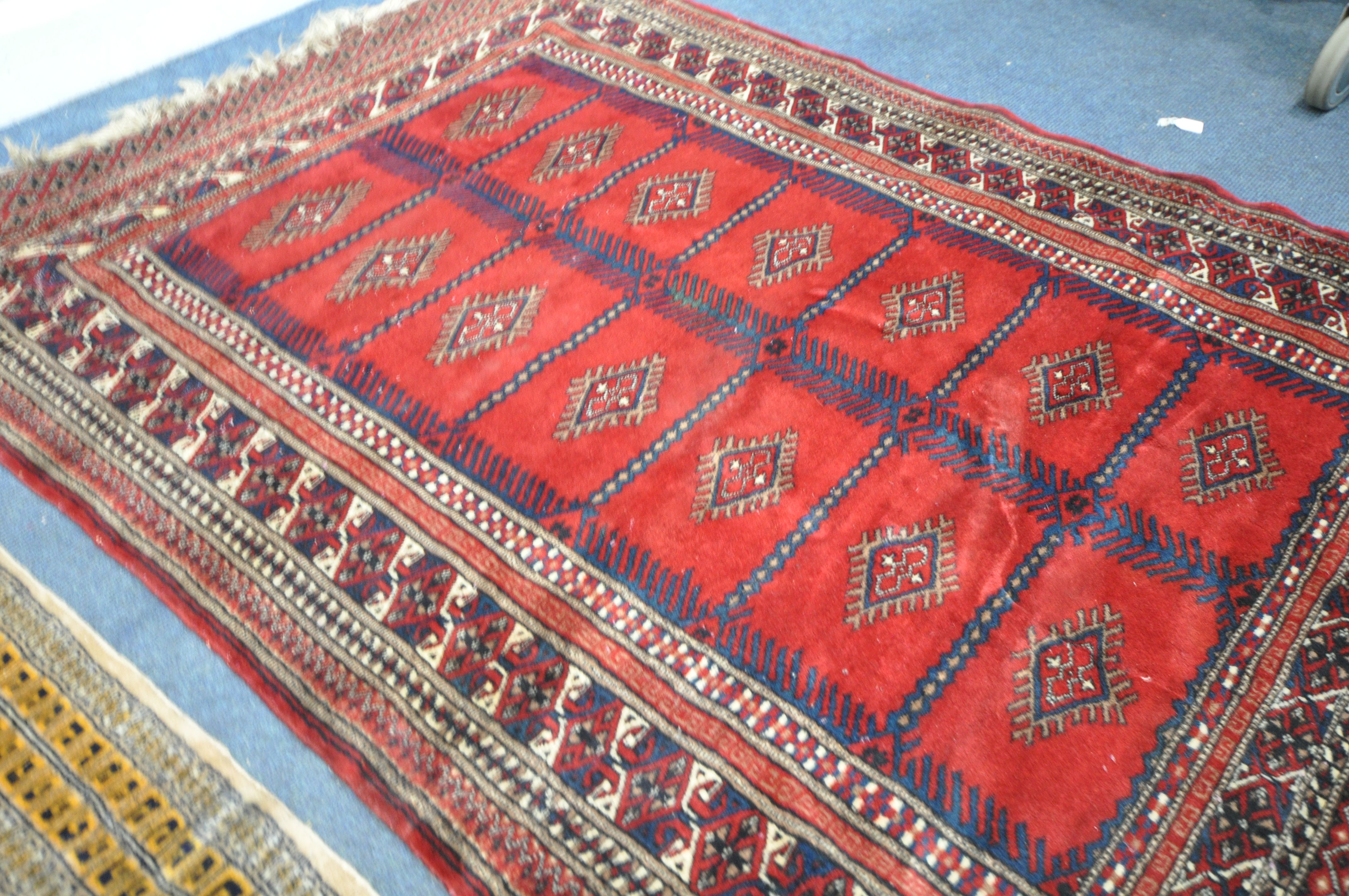 TWO 20TH CENTURY WOOLLEN RUGS one with red field 186cm x 124cm and the other russet coloured, - Image 3 of 6