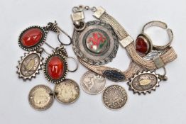 AN ASSORTMENT OF SILVER AND WHITE METAL, the first a silver medallion, enamel detail of a Welsh