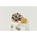 AN 18CT GOLD RUBY AND DIAMOND CLUSTER RING, designed as a tiered cluster set throughout with