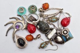 AN ASSORTMENT OF WHITE METAL JEWELLERY, to include four pendants, two charms, three pairs of