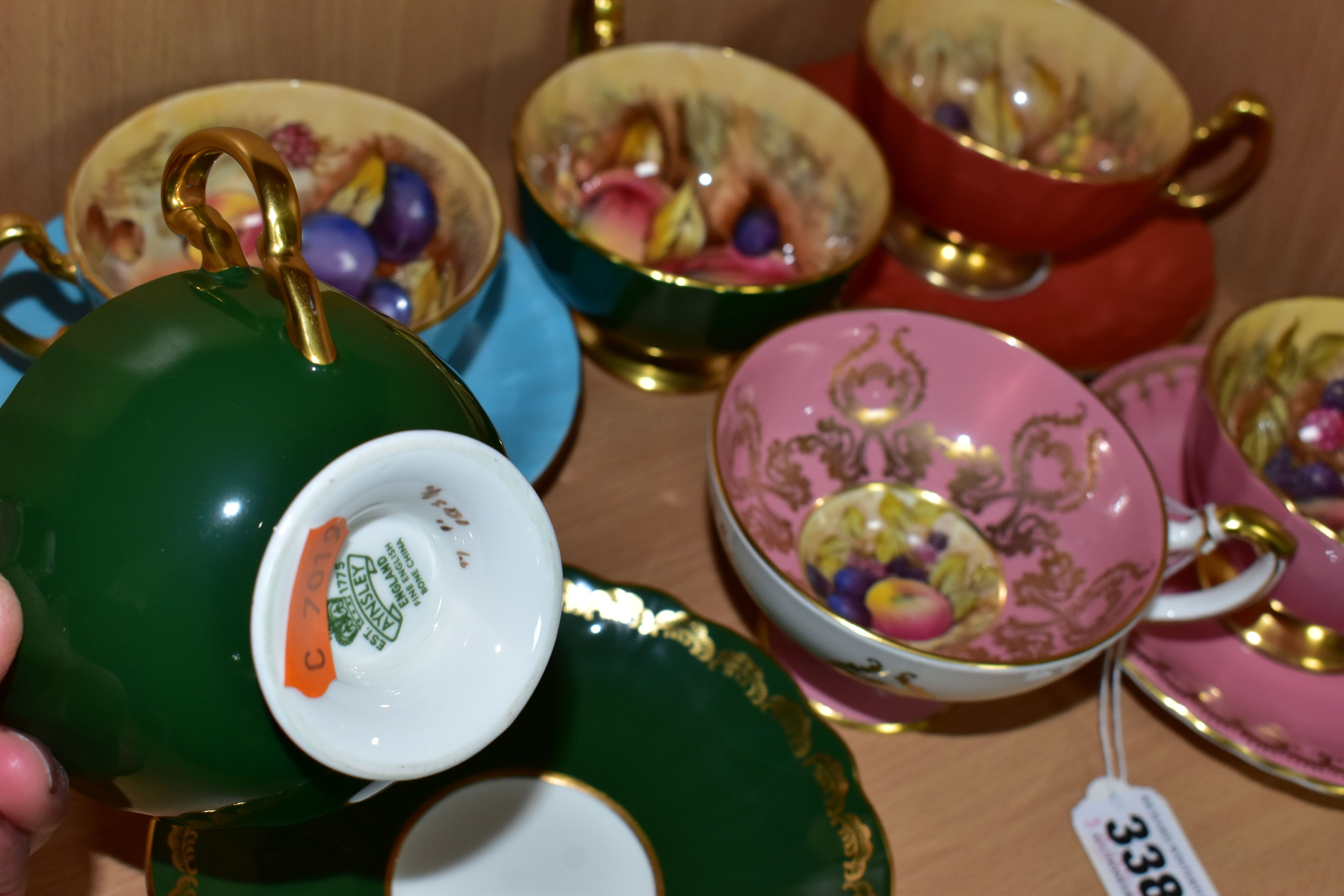 A SET OF FOUR AYNSLEY ORCHARD GOLD CABINET TEA CUPS AND SAUCERS, all cups are signed by D.Jones, - Image 4 of 4