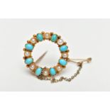 A YELLOW METAL TURQUOISE AND CULTURED PEARL BROOCH, of circular wreath design, set with