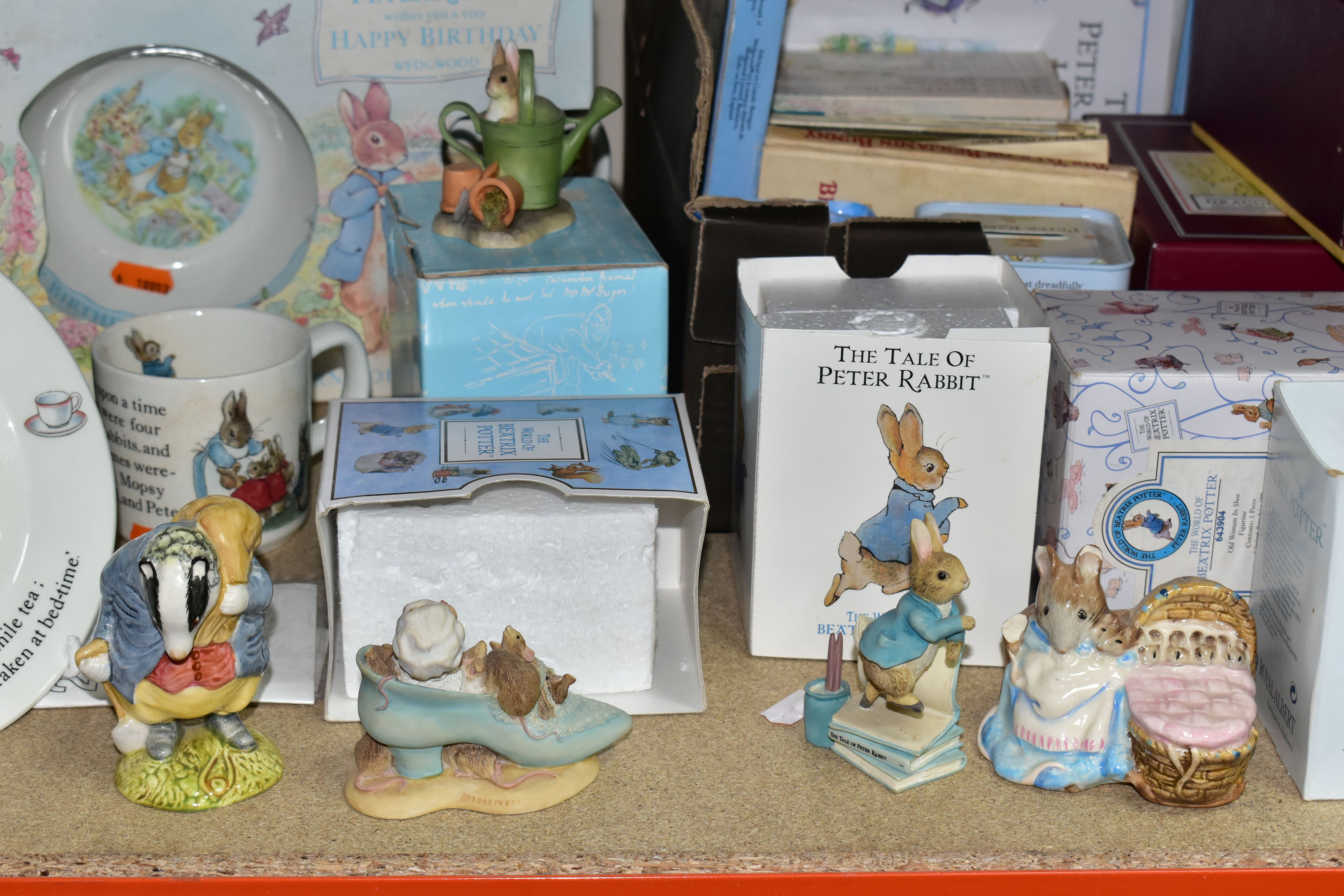 A COLLECTION OF BEATRIX POTTER CERAMICS, ORNAMENTS AND BOOKS, to include a Royal Albert 'Hunca Munca - Image 3 of 5