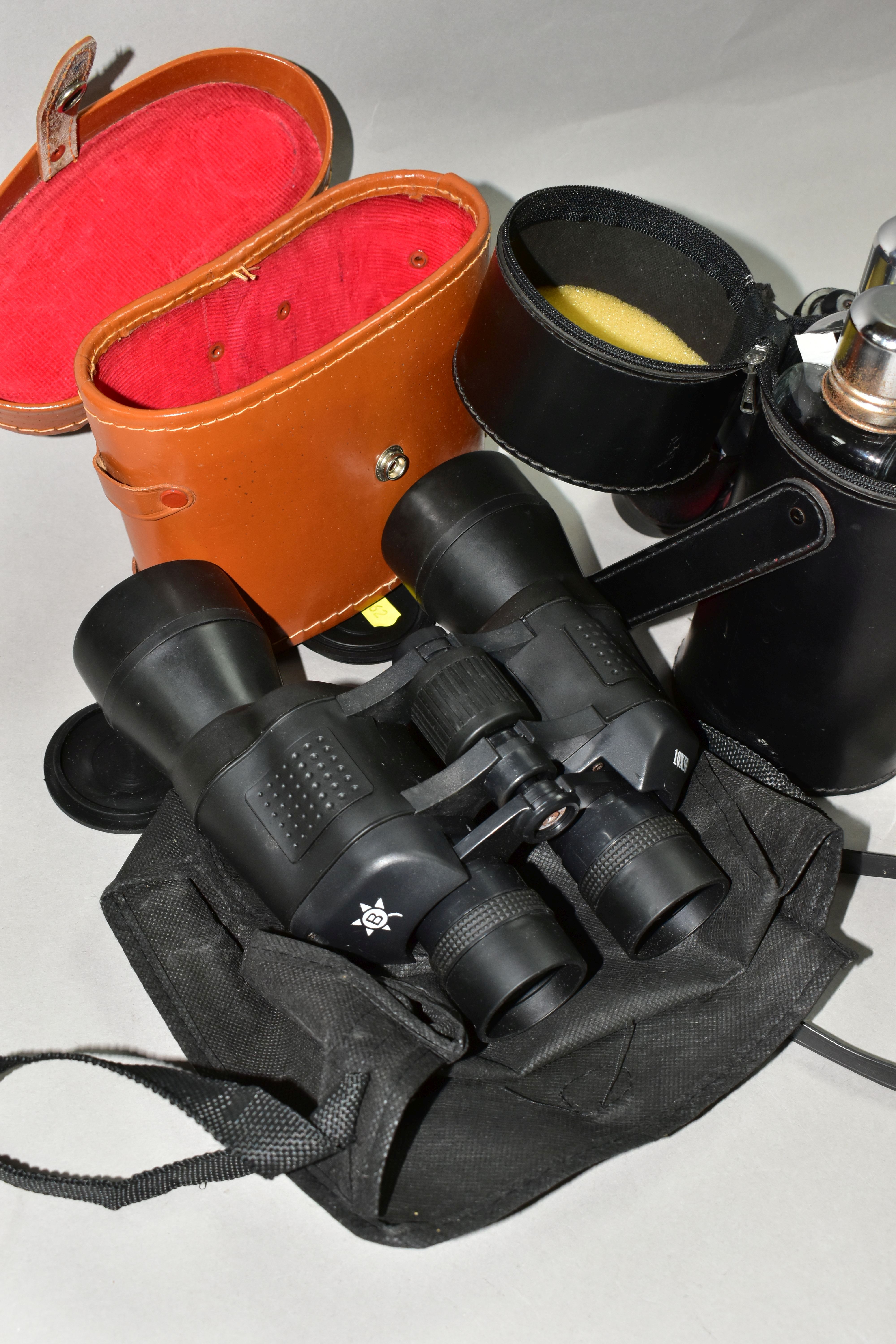 THREE PAIRS OF VINTAGE BINOCULARS, comprising a small pair of Boots binoculars 8x30 in a brown - Image 2 of 3