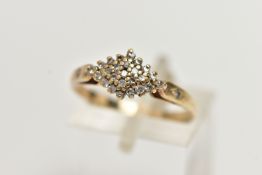 A YELLOW METAL DIAMOND CLUSTER RING, the cluster of a marquise form, set with single cut diamonds,