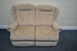 A PINK FLORAL UPHOLSTERED TWO SEATER SOFA, length 136cm (good condition)