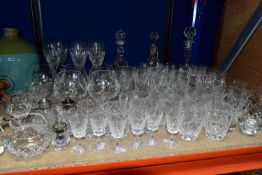 A QUANTITY OF CUT GLASS, comprising a set of six long stemmed wine glasses, sherry glasses,