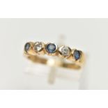 A 9CT YELLOW GOLD, DIAMOND AND SAPPHIRE HALF ETERNITY RING, designed with a row of three circular