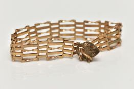 A 9CT GOLD GATE BRACELET, five bar gate bracelet, fitted with a heart padlock clasp and additional