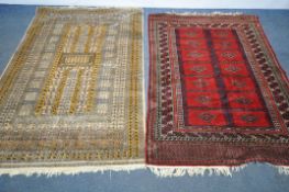 TWO 20TH CENTURY WOOLLEN RUGS one with red field 186cm x 124cm and the other russet coloured,