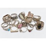 AN ASSORTMENT OF SILVER AND WHITE METAL RINGS, to include a silver ring set with a heart cut cubic