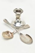 A SILVER DWARF CANDLESTICK AND TWO SPOONS, the polished dwarf candlestick on a round weighted