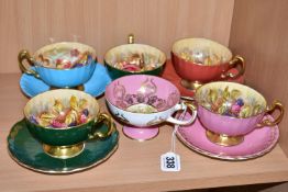 A SET OF FOUR AYNSLEY ORCHARD GOLD CABINET TEA CUPS AND SAUCERS, all cups are signed by D.Jones,