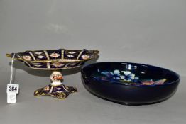 A ROYAL CROWN DERBY IMARI PATTERN DISH TOGETHER WITH A MOORCROFT BOWL, comprising a two handled