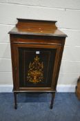 AN EDWARDIAN MAHOGANY AND INLAID SINGLE DOOR CABINET. with a raised back, floral design to door,