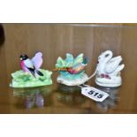 THREE CERAMIC PLACE CARD HOLDERS IN THE FORM OF BIRDS, comprising a Crown Staffordshire pair of