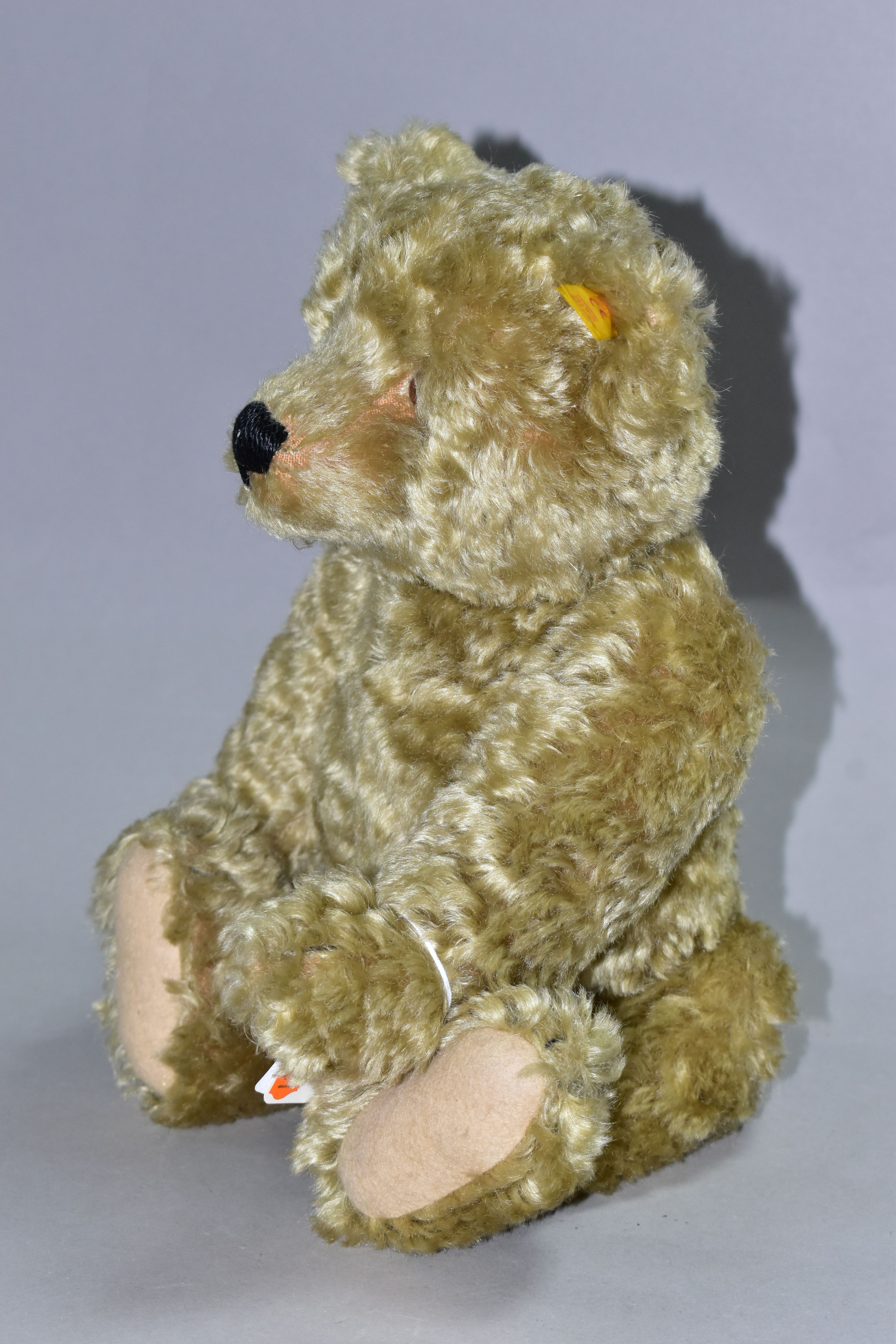 A MODERN STEIFF BLONDE PLUSH MOHAIR TEDDY BEAR, No.654466, button and yellow tag to left ear, - Image 4 of 4